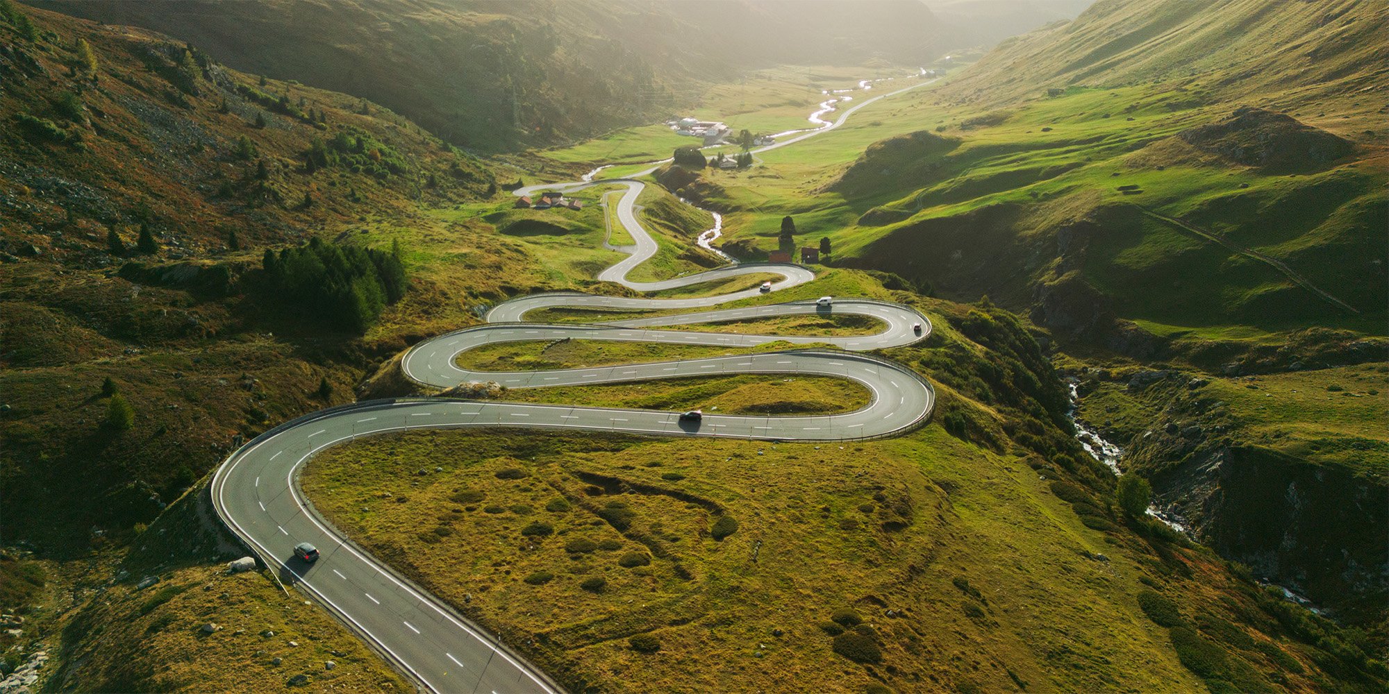 A winding road through a mountain valley