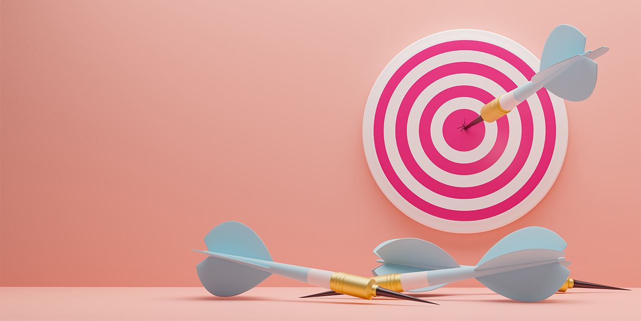 A image of darts and a target with one bullseye 