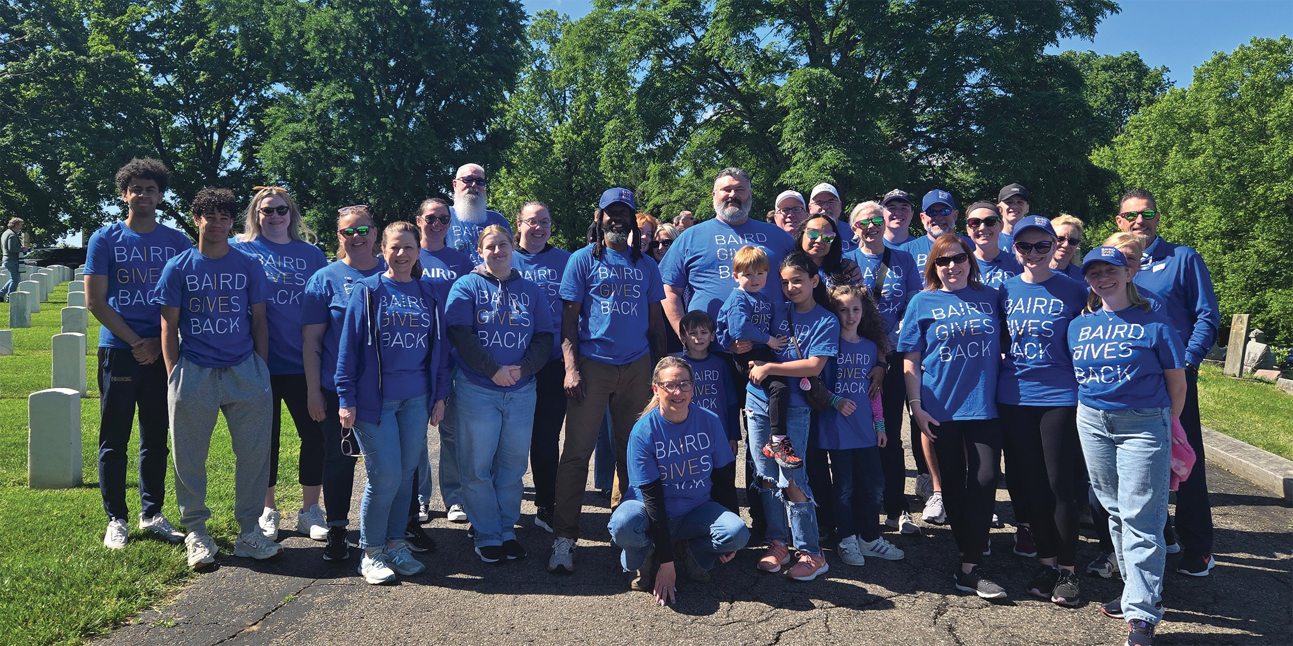 Baird Trust associates volunteering at Cave Hill Cemetary